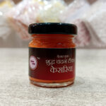 Kesar Yukt Kesariya Chandan Tilak – Liquid tilak with Kesar, ideal for sacred rituals and pooja ceremonies
